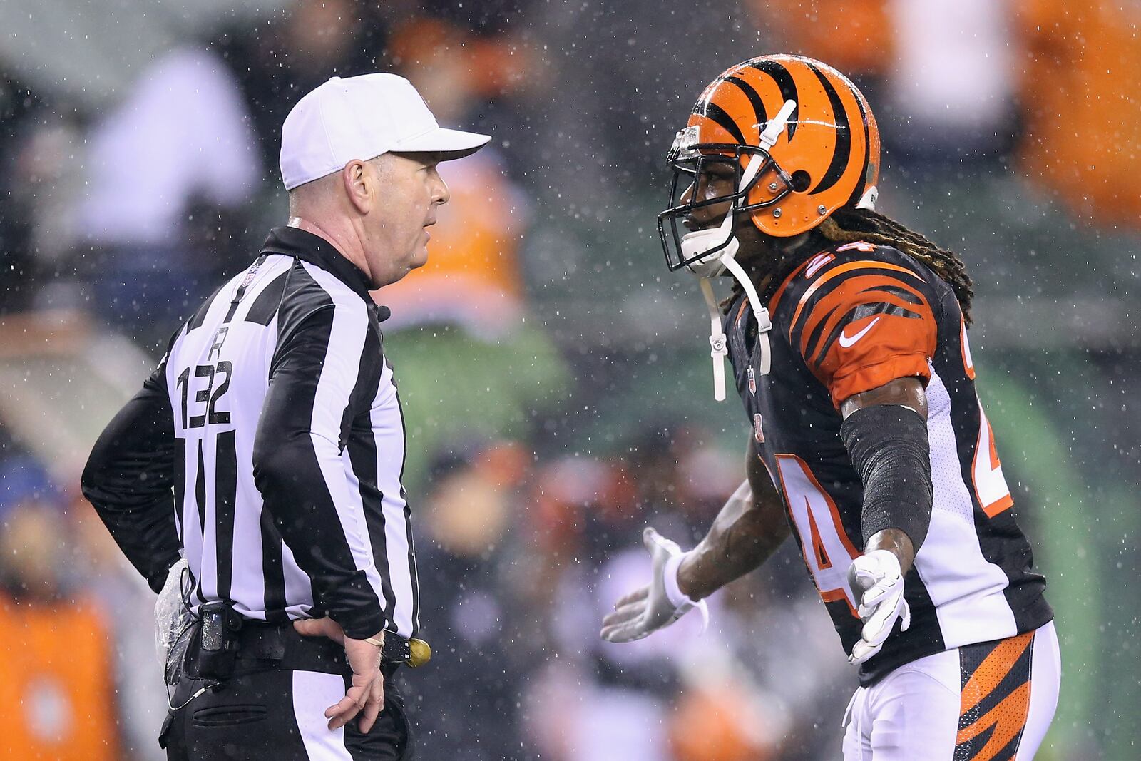 CINCINNATI, OH - JANUARY 09: Adam Jones #24 of the Cincinnati Bengals argues a call with referee John Parry #132 in the fourth quarter against the Pittsburgh Steelers during the AFC Wild Card Playoff game at Paul Brown Stadium on January 9, 2016 in Cincinnati, Ohio. (Photo by Andy Lyons/Getty Images)