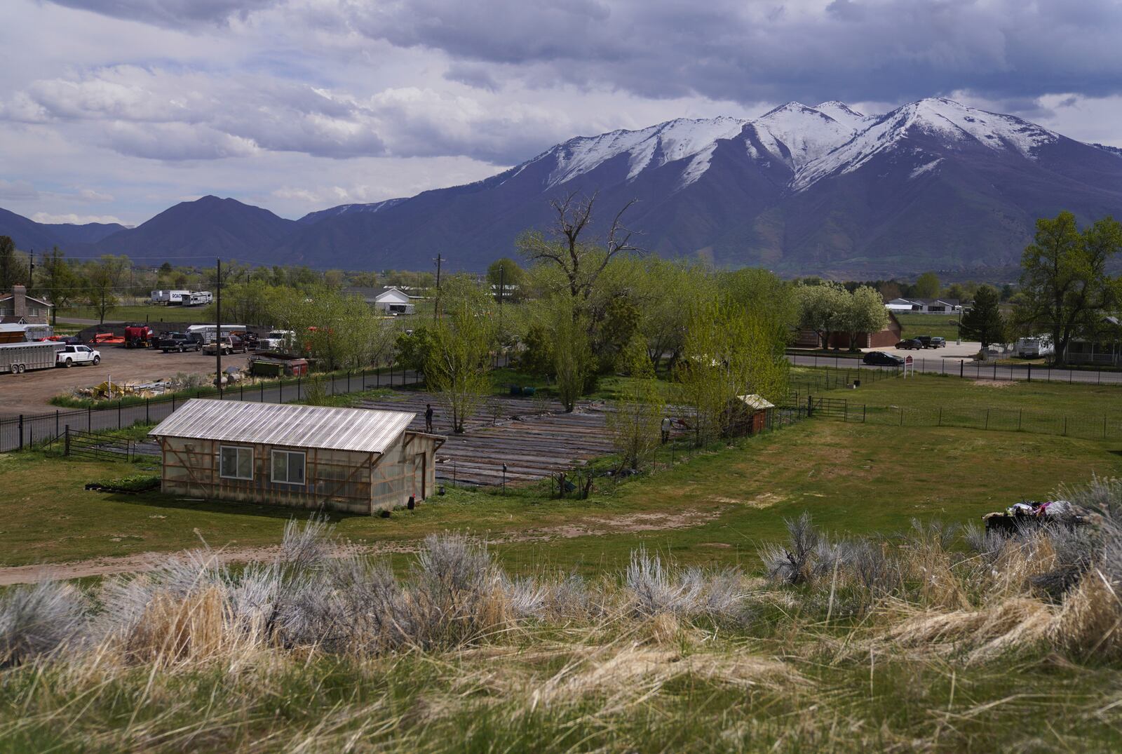 A greenhouse sits on the edge of the Shri Shri Radha Krishna Temple property in Spanish Fork, Utah, on Friday, April 25, 2025. (AP Photo/Jessie Wardarski)