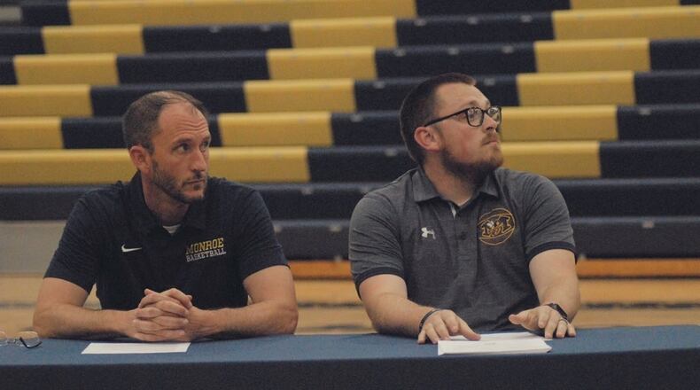 Casey Popplewell (left) and Justin Clemmons were introduced as Monroe High School's new boys basketball and girls basketball coaches at a community event on Monday. Chris Vogt/CONTRIBUTED