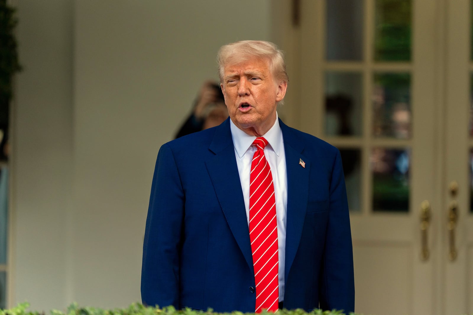 President Donald Trump speaks with reporters in front of the West Wing of the White House, Thursday, May 8, 2025, in Washington. (AP Photo/Alex Brandon)