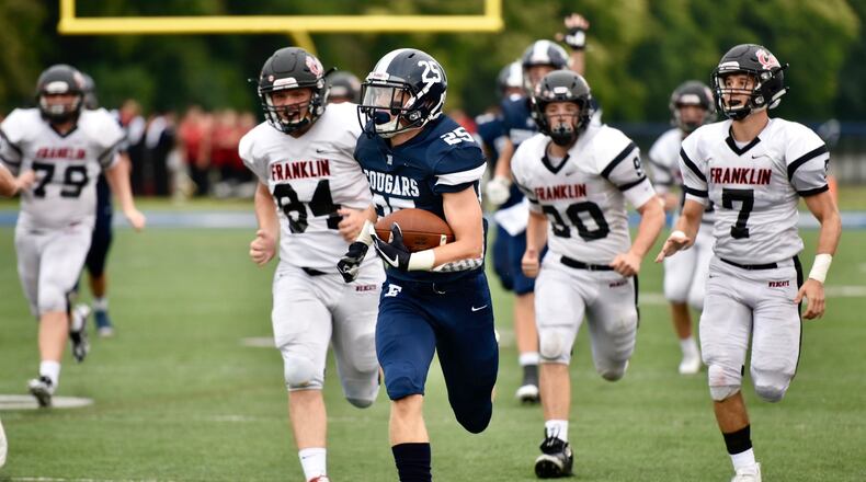 Edgewood’s Wade Phillips outruns the Franklin defense for an 80-yard touchdown on the first play from scrimmage during Friday night’s game at Kumler Field in St. Clair Township. NICK GRAHAM/STAFF
