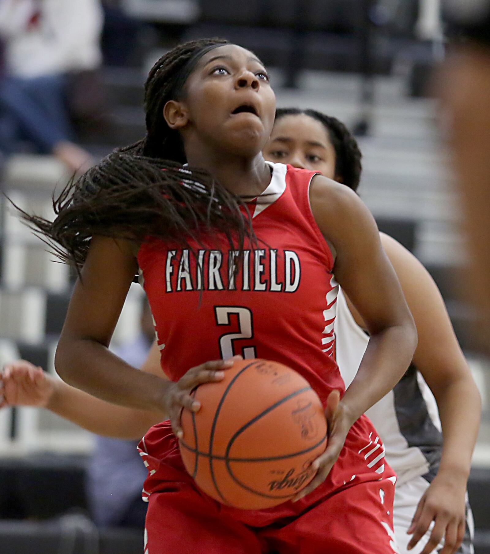 Fairfield guard Zaria Black gets a basket and a foul from Withrow’s Ciara McGhee during their Division I sectional game at Lakota East on Saturday afternoon. CONTRIBUTED PHOTO BY E.L. HUBBARD