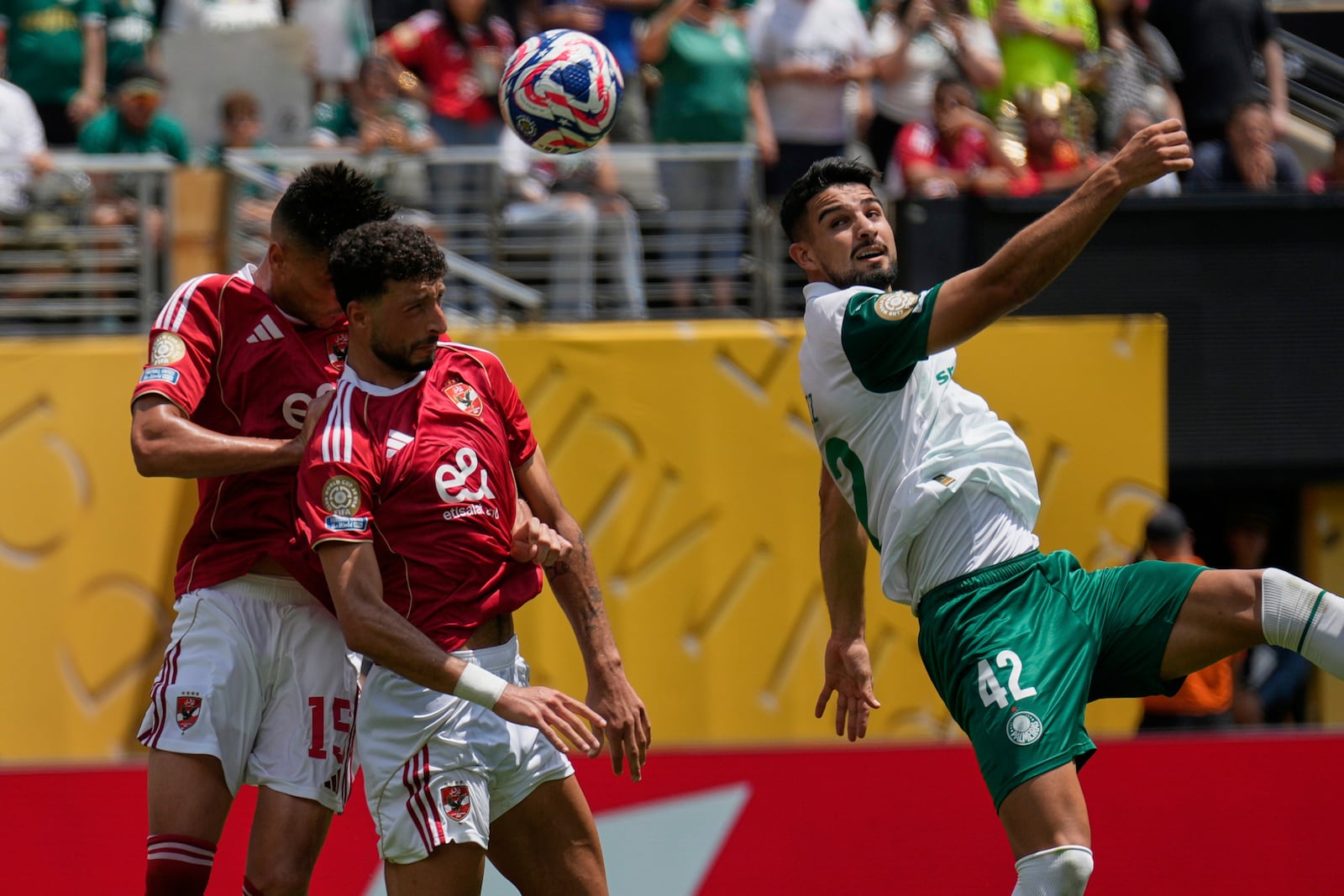 Al Ahly's Wessam Abou Ali, center, scors an own goal during the Club World Cup group A soccer match between Palmeiras and Al Ahly in East Rutherford, N.J., Thursday, June 19, 2025. (AP Photo/Seth Wenig)