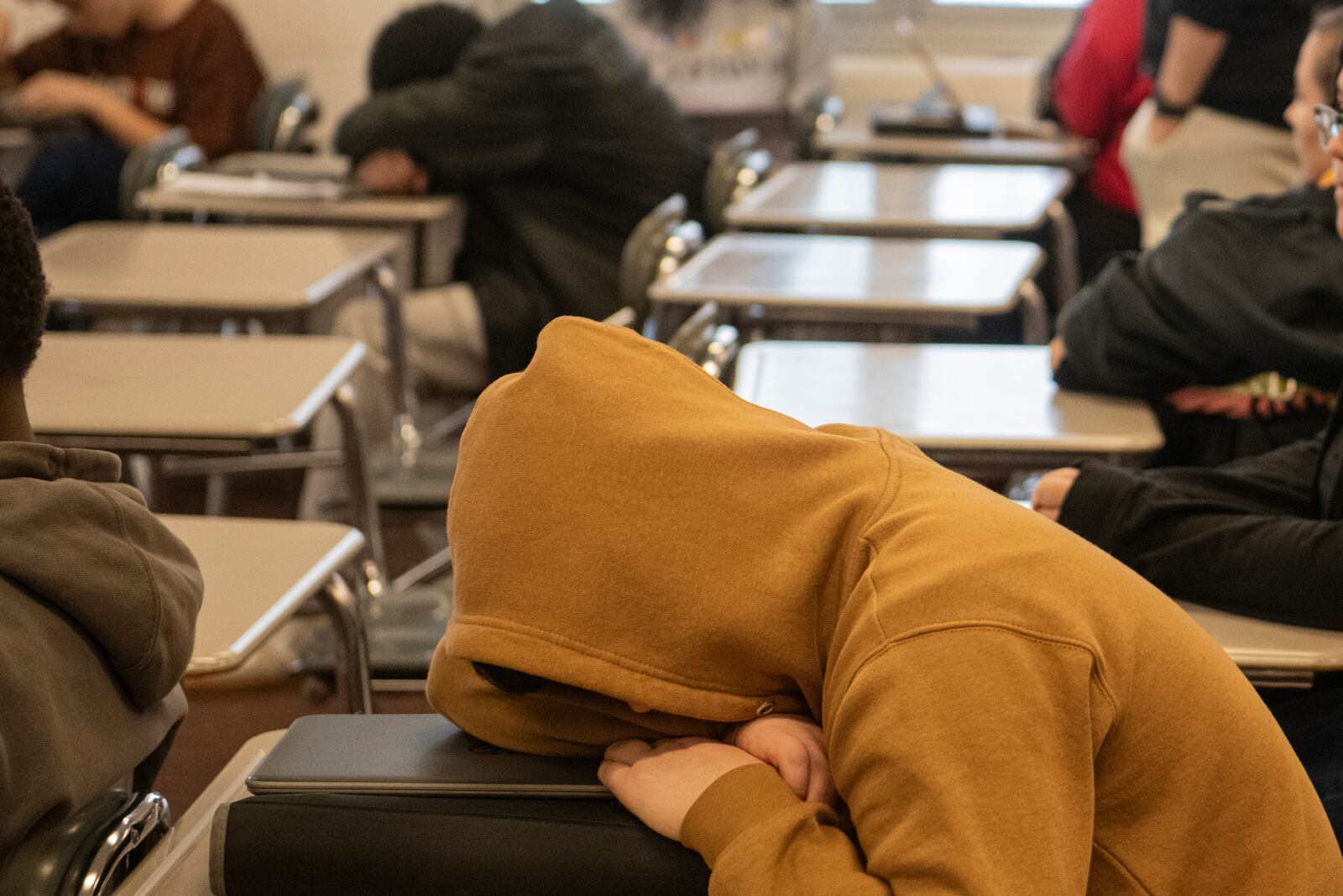 FILE - A Mansfield Senior High School student rests during his health class on sleep, in Mansfield, Ohio, Dec. 6, 2024. (AP Photo/Phil Long)
