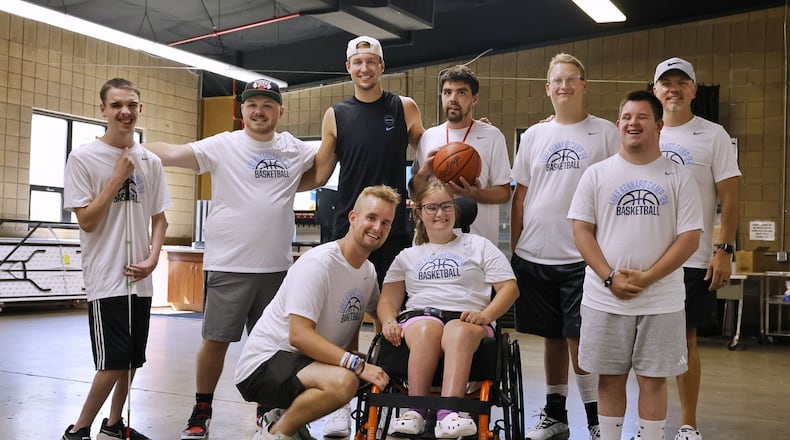 A basketball game called "One Special Game" was held for those with special needs during the Luke Kennard basketball camp at Camp Chautauqua Saturday, July 20, 2024. Camp attendees cheered on the players during the event. NICK GRAHAM/STAFF