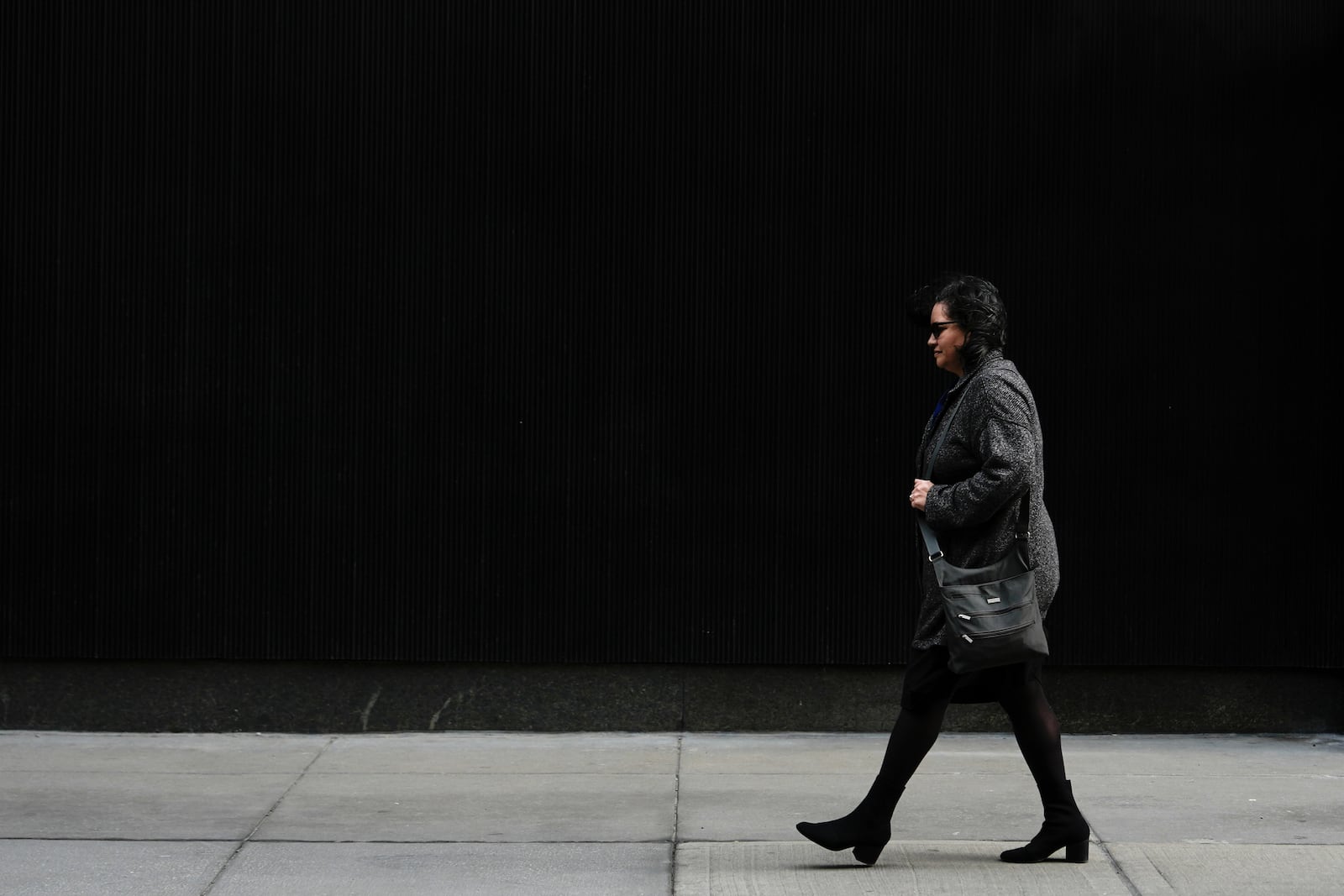 FILE - Karen Ortiz, an administrative judge at the Equal Employment Opportunity Commission, walks to her office, Wednesday, Feb. 26, 2025, in New York. (AP Photo/Julia Demaree Nikhinson,File)