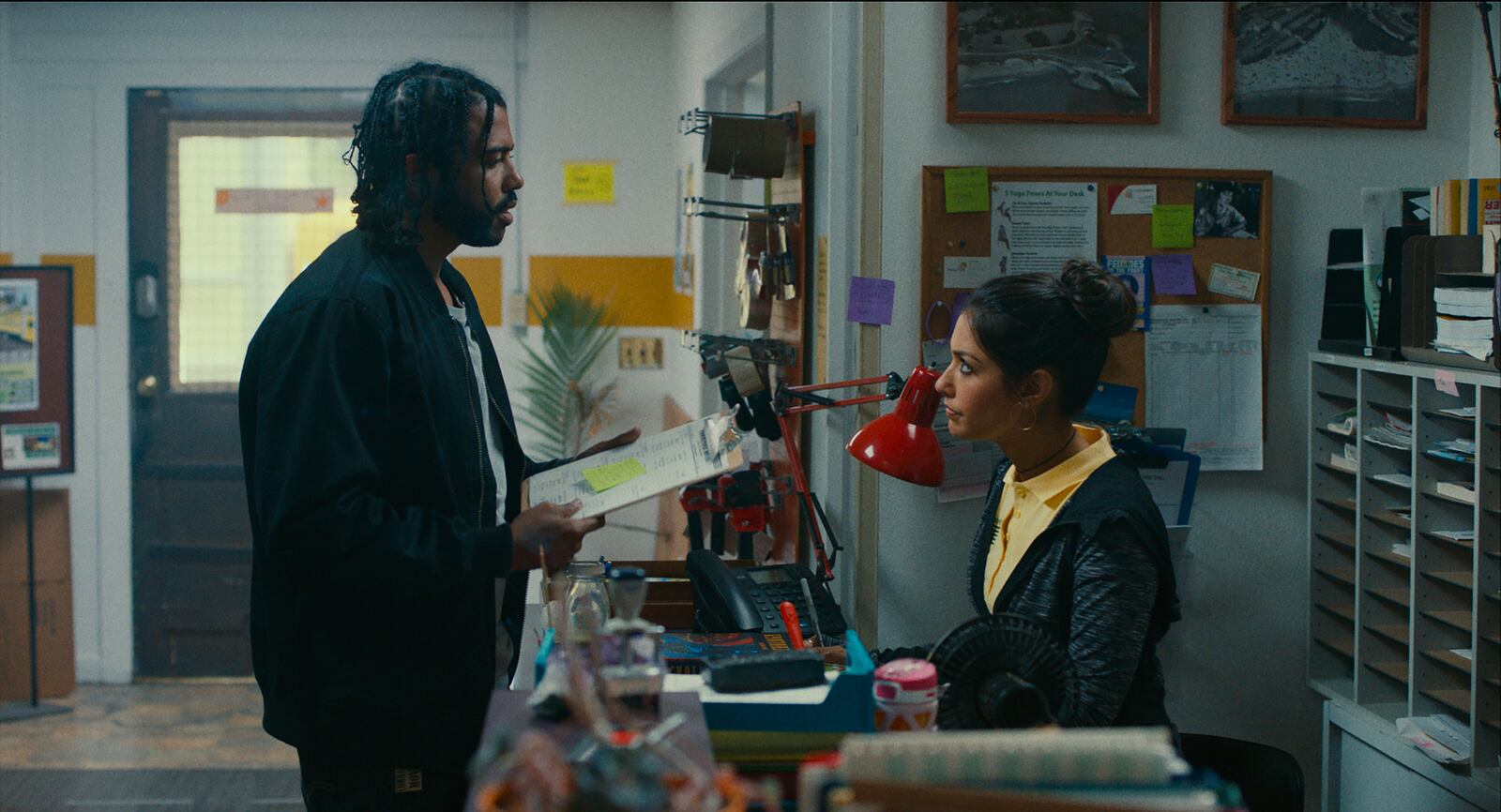 Daveed Diggs as “Collin” and Janina Gavankar as “Val” in BLINDSPOTTING. Photo by: Robby Baumgartner.