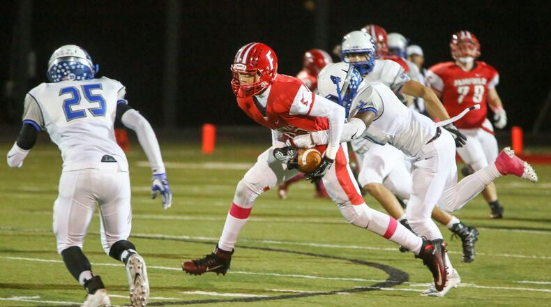 Fairfield wide receiver Erick All (83) makes a catch over the middle during the Indians’ 42-0 win over Hamilton last Friday at Fairfield Stadium. GREG LYNCH/STAFF