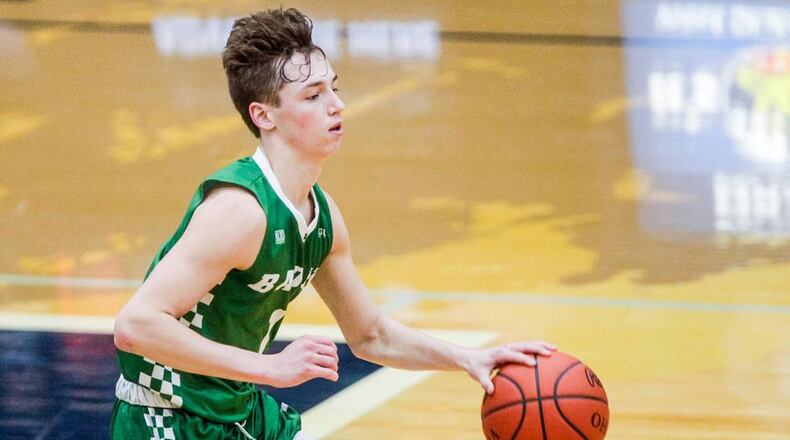 Badin’s Joseph Walsh dribbles down the floor during a 49-46 win at Edgewood on Dec. 28, 2018. NICK GRAHAM/STAFF
