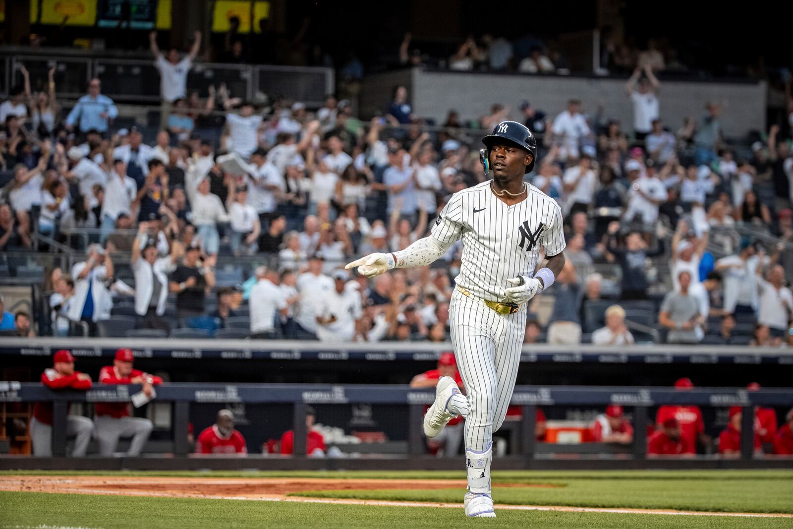 New York Yankees' Jazz Chisholm Jr. (13) celebrates a home run during the second inning of a baseball game against the Los Angeles Angels, Wednesday, June 18, 2025, in New York. (AP Photo/Angelina Katsanis)