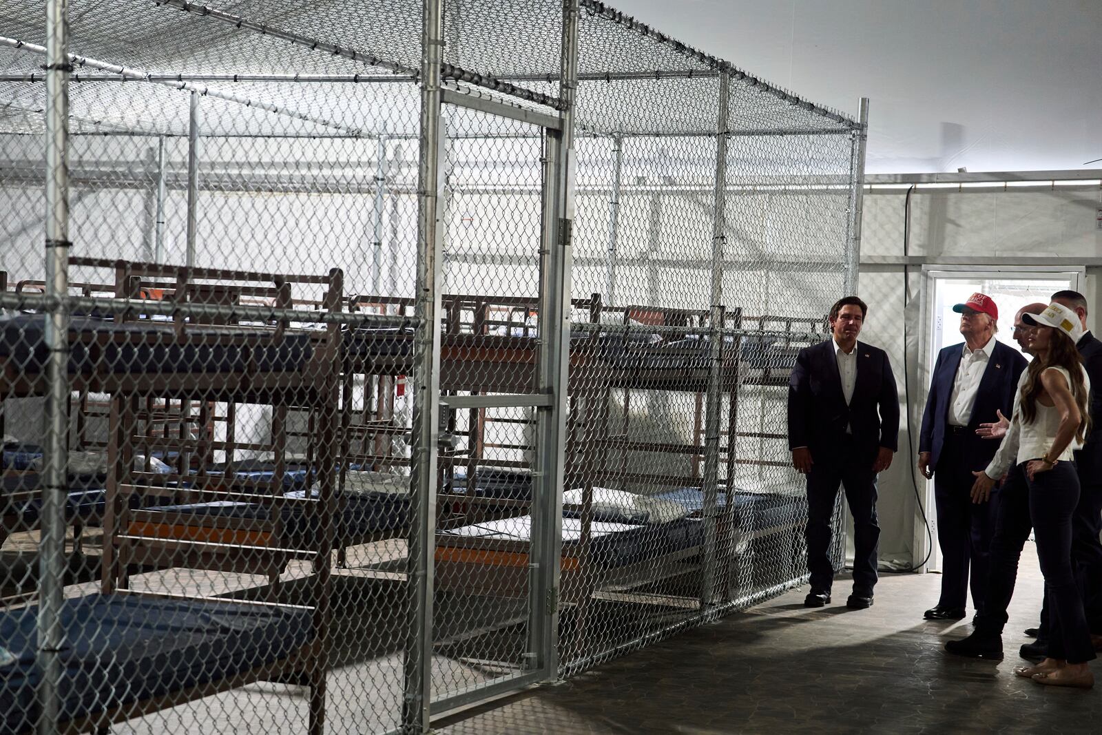 President Donald Trump tours "Alligator Alcatraz," a new migrant detention facility at Dade-Collier Training and Transition facility, Tuesday, July 1, 2025, in Ochopee, Fla. (AP Photo/Evan Vucci)