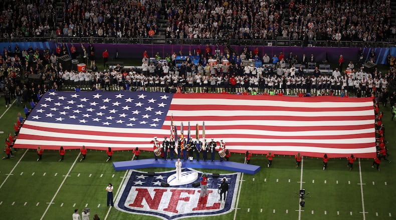 MINNEAPOLIS, MN - FEBRUARY 04: Pink sings the national anthem prior to Super Bowl LII between the New England Patriots and the Philadelphia Eagles at U.S. Bank Stadium on February 4, 2018 in Minneapolis, Minnesota. (Photo by Christian Petersen/Getty Images)