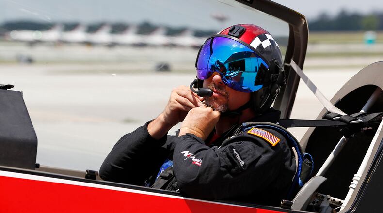 Aerobatic pilot Rob Holland prepares for a flight eon Wednesday in preparation for the Vectren Dayton Air Show this coming weekend.   TY GREENLEES / STAFF