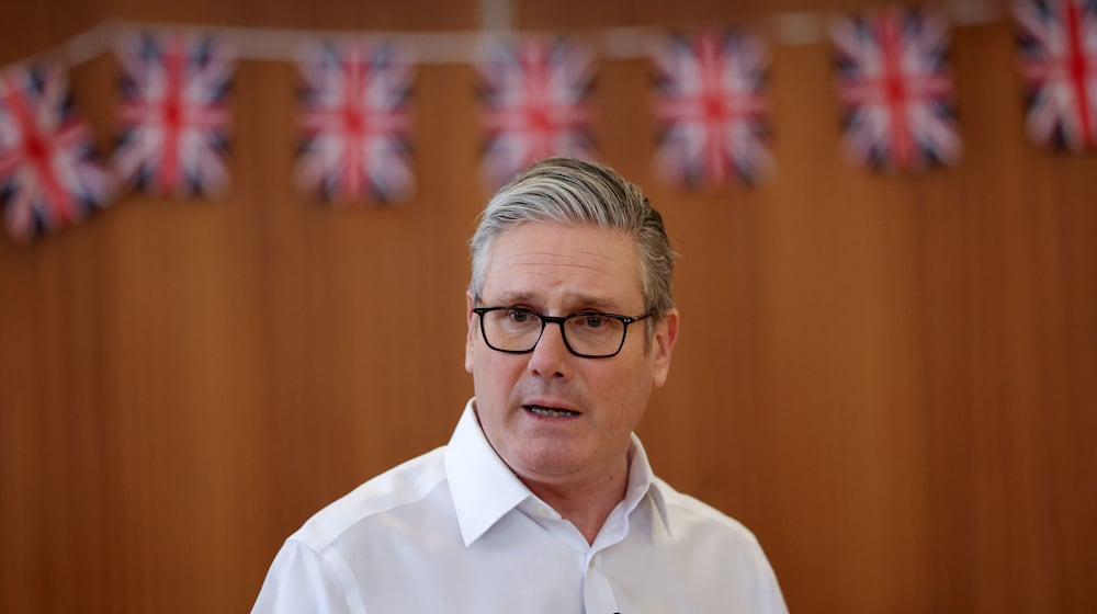 Britain's Prime Minister Keir Starmer visits a community centre in Welwyn Garden City, England, Tuesday Feb. 10, 2026. (Suzanne Plunkett/Pool Photo via AP)