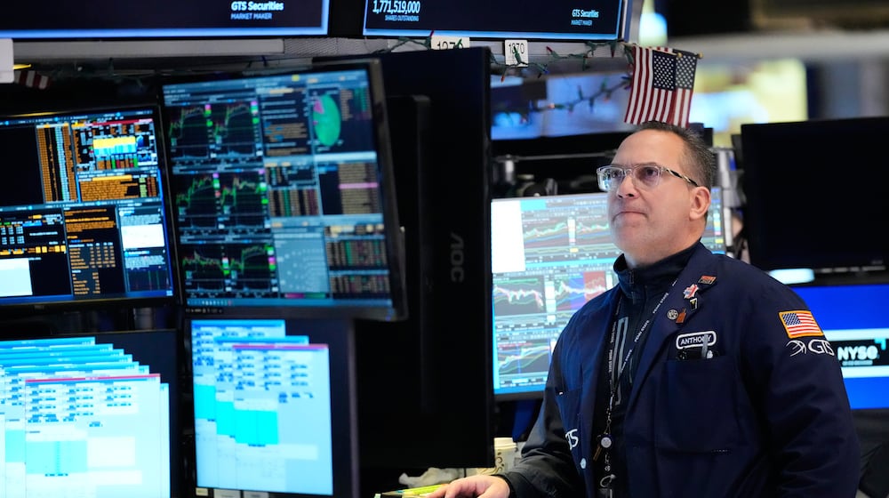 Anthony Matesic works on the floor at the New York Stock Exchange in New York, Thursday, March 5, 2026. (AP Photo/Seth Wenig)