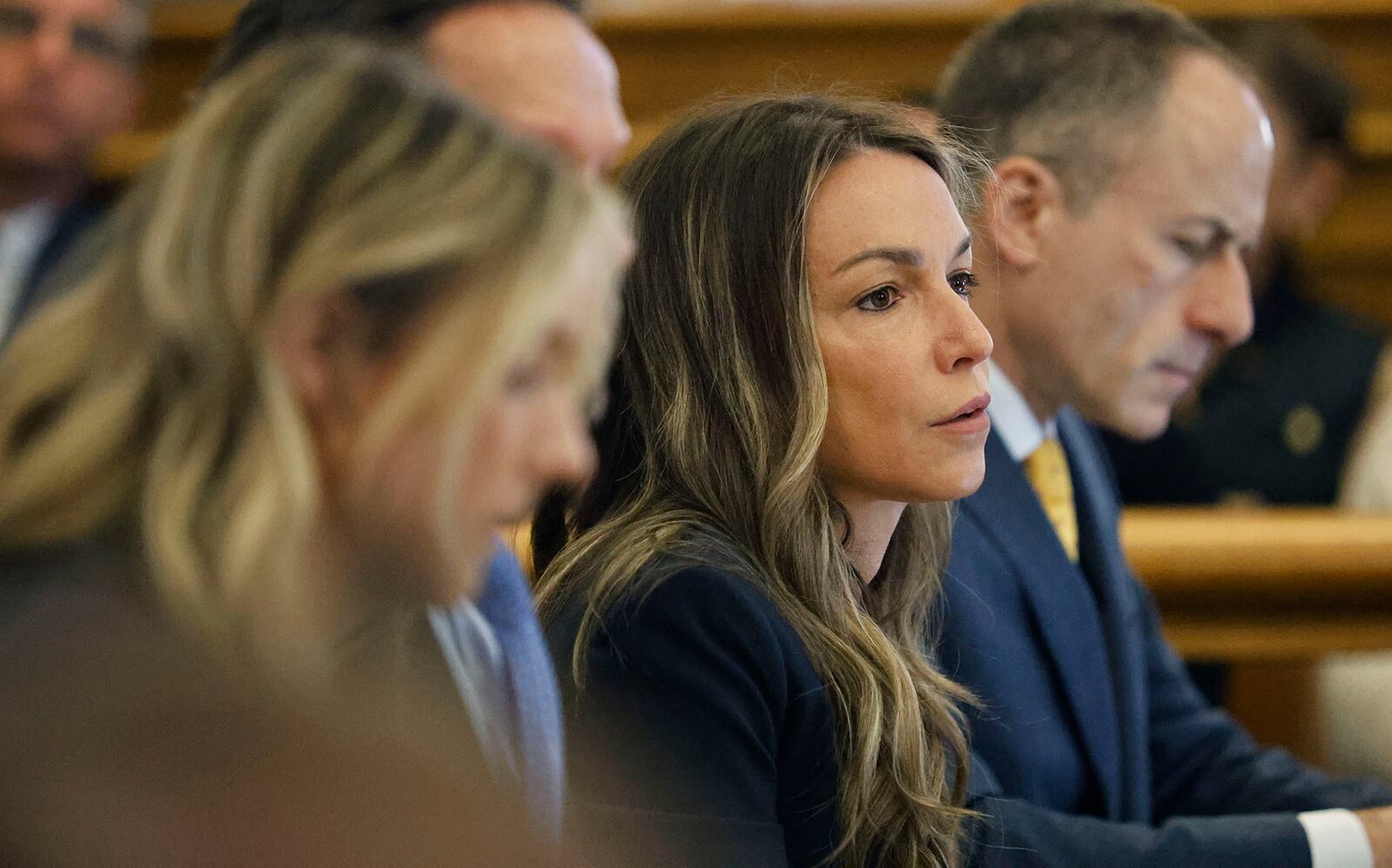 Karen Read listens to the testimony of Kerry Roberts during her trial at Norfolk Superior Court at Dedham, Mass., on Wednesday, April 23, 2025 (Greg Derr/The Patriot Ledger via AP, Pool)