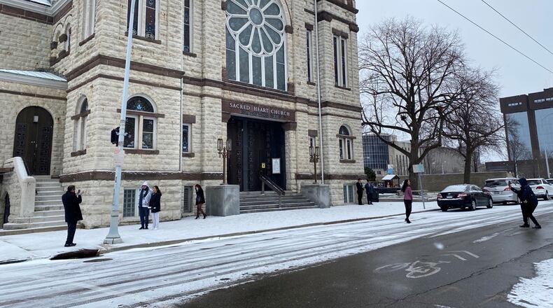 Snow fell across the Miami Valley and in downtown Dayton on Christmas Day on Friday, Dec. 25, 2020. ERIC SCHWARTZBERG / STAFF