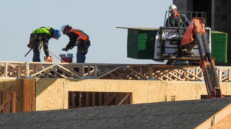 Construction continues on The Marcum retail and living complex in Hamilton Wednesday, Nov. 29. NICK GRAHAM/STAFF