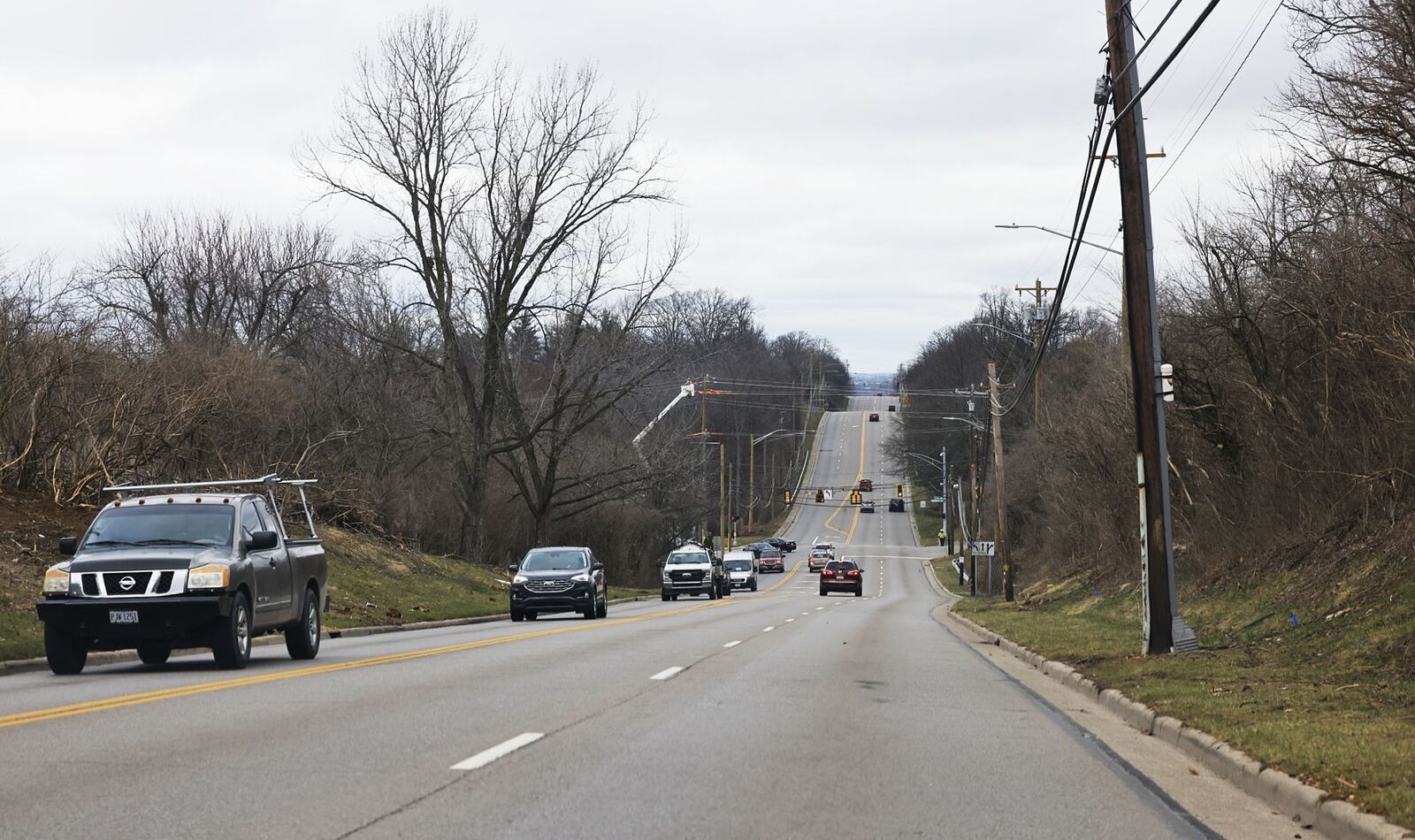 Crews work on relocating utility lines for the South Gilmore Road widening project Wednesday, Feb. 28, 2024 in Fairfield. NICK GRAHAM/STAFF