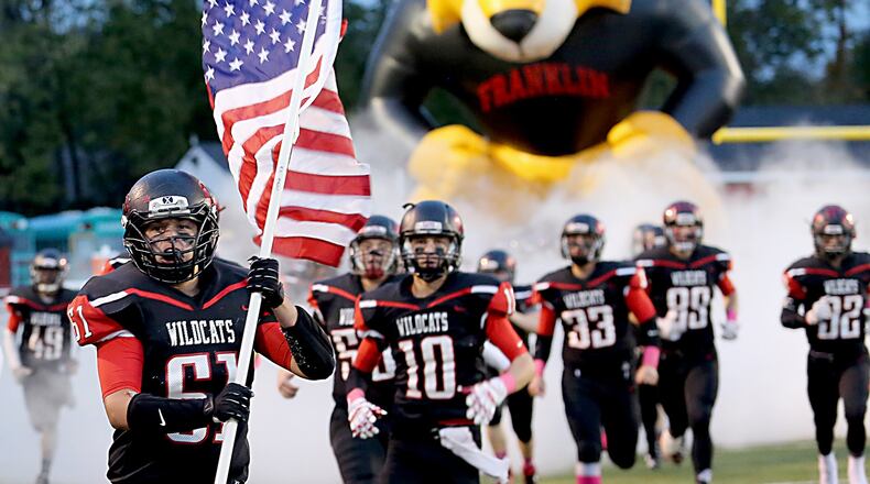 The Franklin Wildcats run onto the field before their game against the Oakwood Lumberjacks at Atrium Stadium in Franklin on Oct. 21, 2016. CONTRIBUTED PHOTO BY E.L. HUBBARD