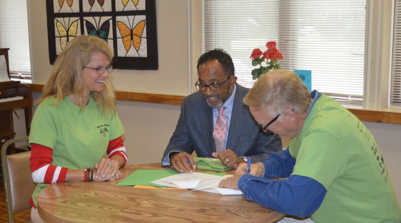 Signing the Memorandum of Understanding between Miami University and Oxford Seniors Monday were, from left, Renate Crawford, Michael Dantley and Rich Bement. CONTRIBUTED/BOB RATTERMAN