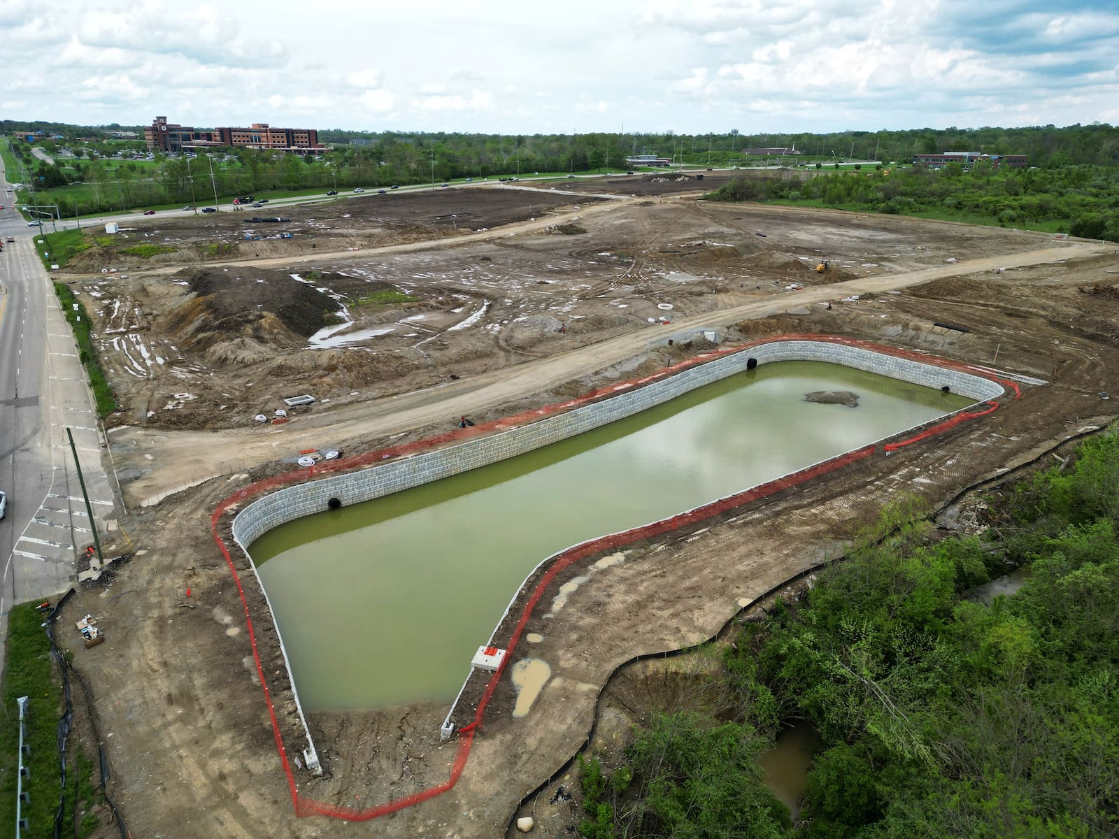 Infrastructure work is near completion for a proposed 160,000-square-foot multipurpose event center along Interstate 75 on the east side of Middletown at Ohio 122 and Union Road, shown by aerial view Friday, May 2, 2025. NICK GRAHAM/STAFF