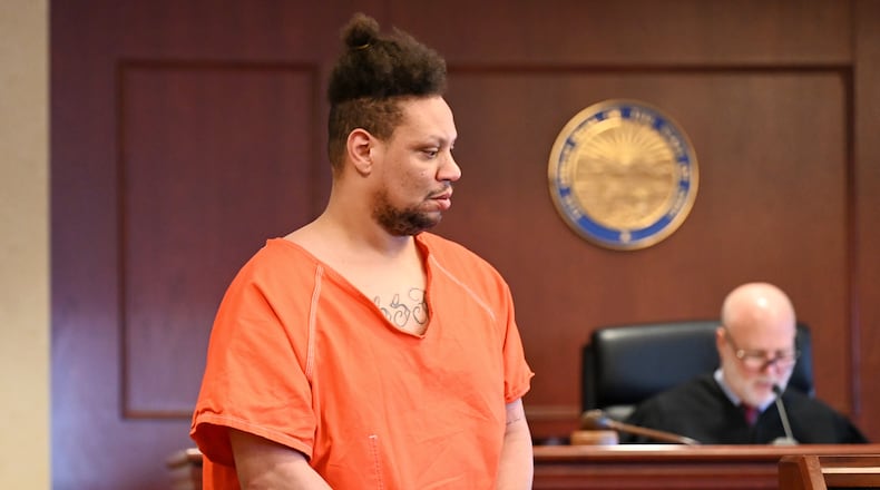 Roger Reed, 40, of Hamilton, was arraigned on Monday morning, March 24, 2025, before Butler County Common Pleas Judge Greg Howard, after being indicted on 10 felony counts, including rape, gross sexual imposition and sexual battery. The two rape charges carry a maximum lifetime sentence as the alleged victims were under 13 years old. MICHAEL D. PITMAN/STAFF