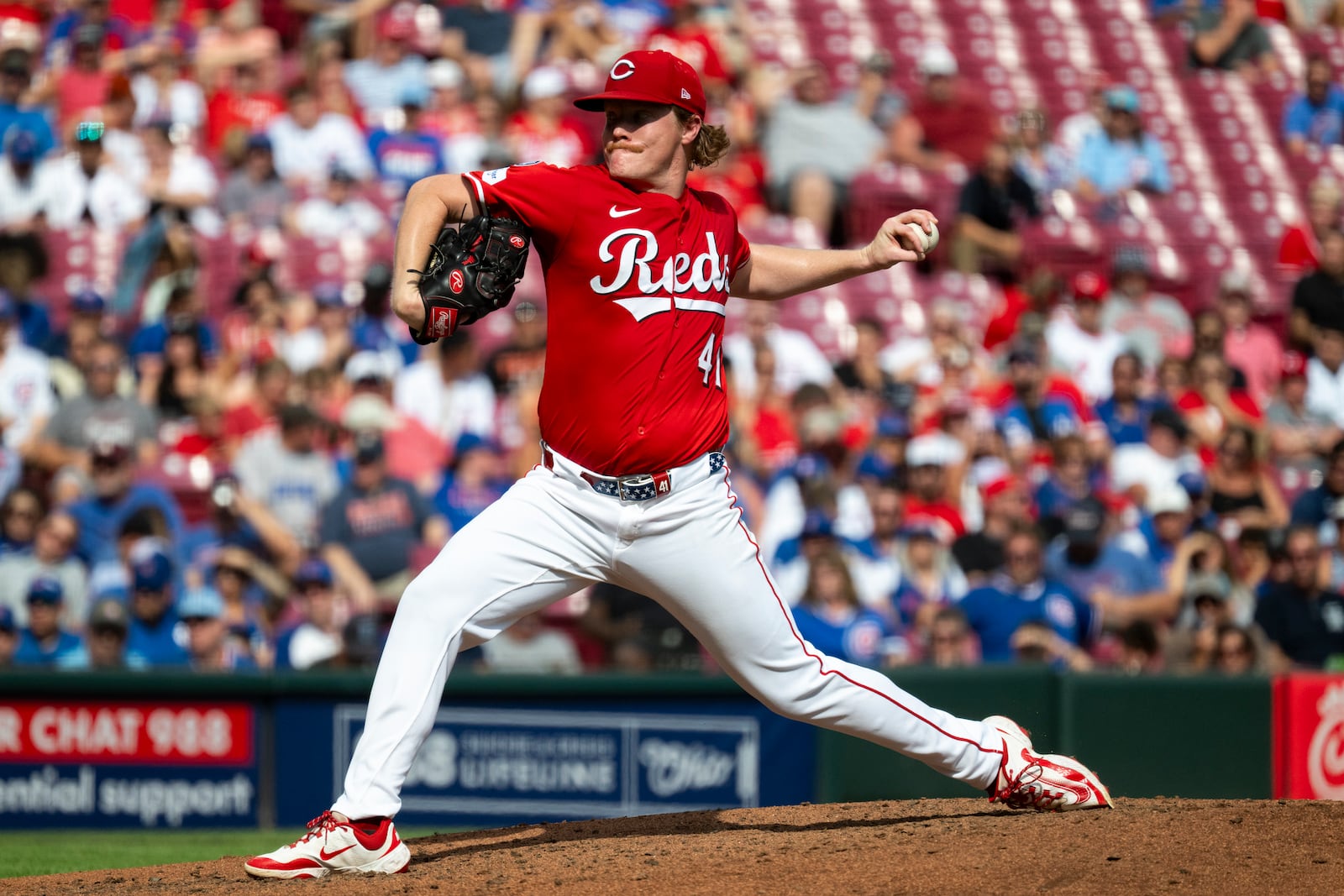 Cincinnati Reds pitcher Andrew Abbott delivers in the third inning of a baseball game against the Chicago Cubs, Sunday, Sept. 21, 2025, in Cincinnati. (AP Photo/Michael Swensen)