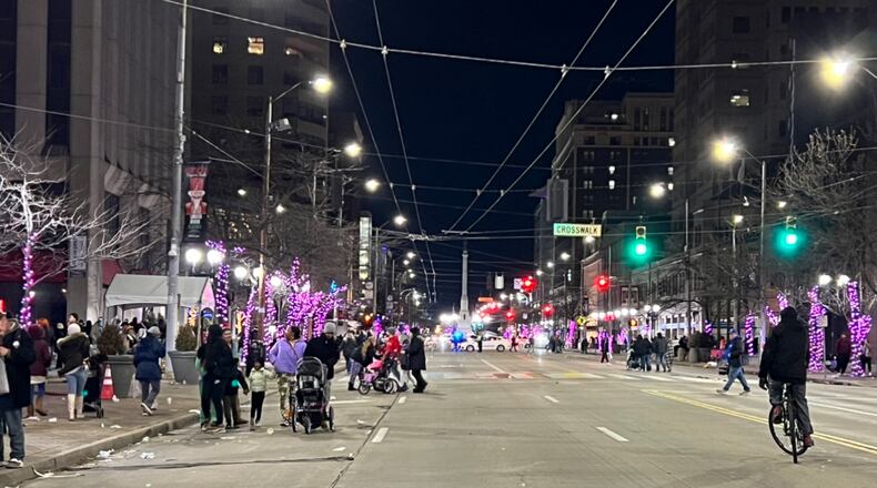 Crowds fled the area around the Dayton Children's Parade on Friday, Nov. 25, 2022, after a single gunshot was heard. No one was injured. ALLISON SWANSON/STAFF