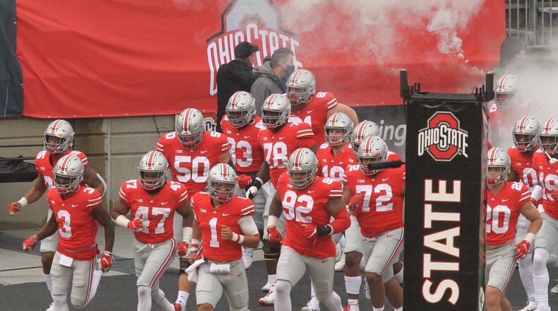 Ohio State takes the field before a game against Indiana on Saturday, Nov. 22, 2020, at Ohio Stadium in Columbus. David Jablonski/Staff