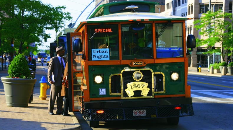 A couple that is moving to Hamilton from Florida is planning to offer a trolley service — not on tracks, but on tires — for fun tours and rides through the city. Pictured is a Dayton area trolley. FILE PHOTO