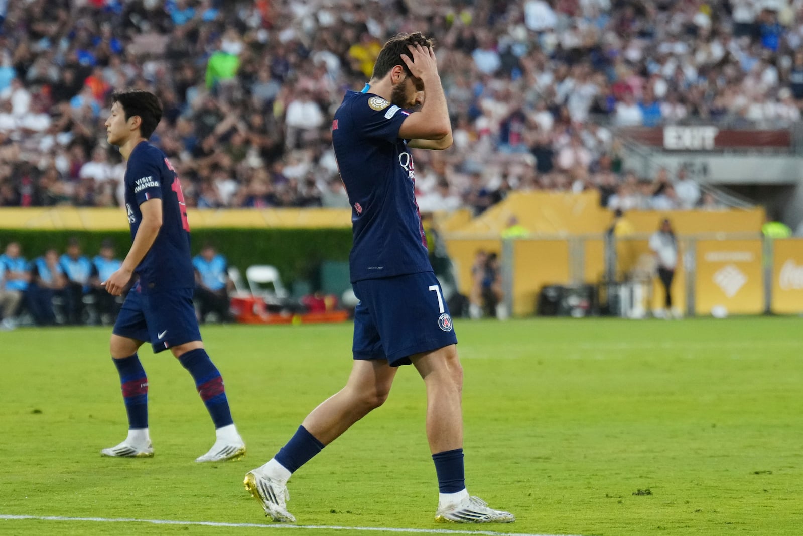 Paris Saint-Germain's Khvicha Kvaratskhelia reacts after his free kick went above the goal during the Club World Cup group B soccer match between PSG and Botafogo in Pasadena, Calif., Thursday, June 19, 2025. (AP Photo/Jae C. Hong)