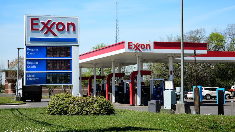 Prices are displayed on an Exxon gas station sign in Houston, Tuesday, March 17, 2026. (AP Photo/Ashley Landis)