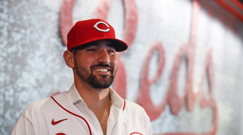Cincinnati Reds’ Nick Castellanos waits for interviews during a news conference, Tuesday, Jan. 28, 2020, in Cincinnati. Castellanos signed a $64 million, four-year deal with the baseball club. (AP Photo/John Minchillo)
