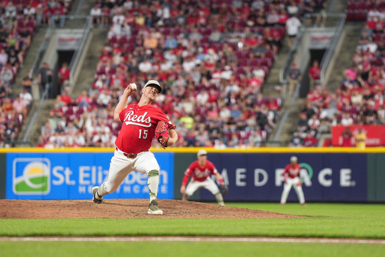 Cincinnati Reds pitcher Emilio Pagán (15) throws during the ninth inning of a baseball game against the Cleveland Guardians, Saturday, May 17, 2025, in Cincinnati. (AP Photo/Jeff Dean)
