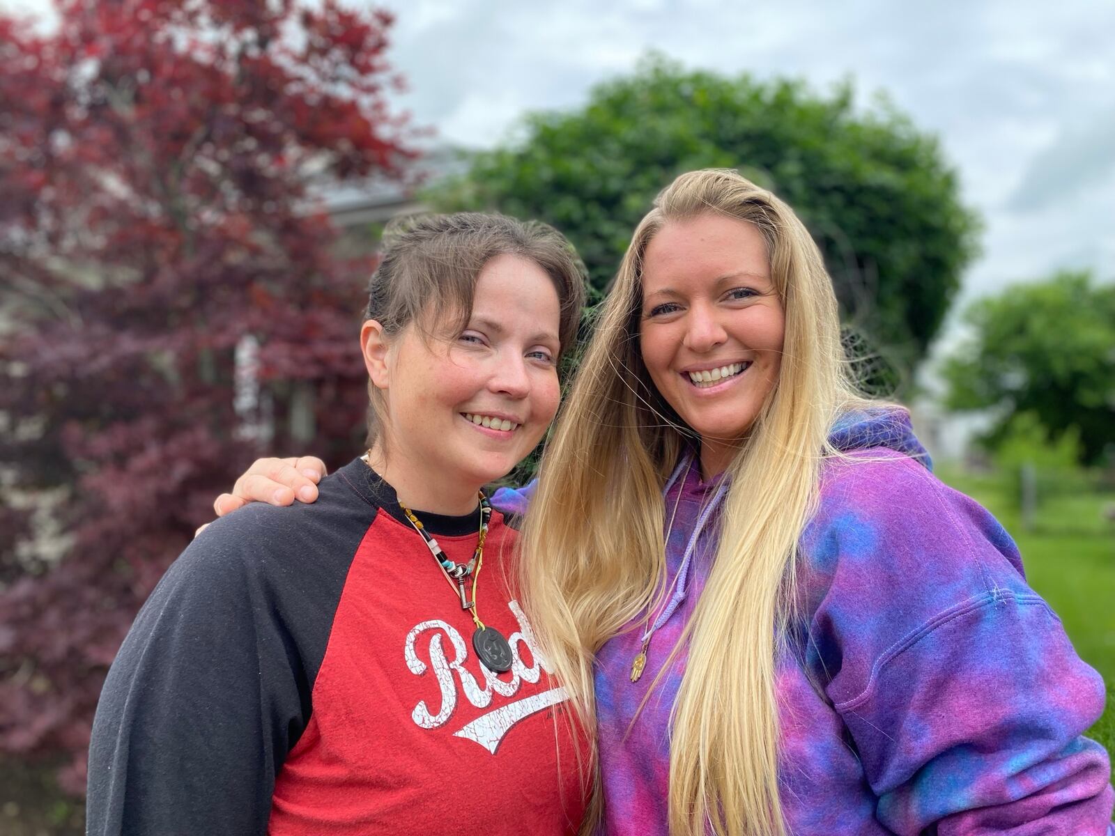 Samantha Stewart, left, has a rare brain aneurysm. After her diagnosis several years ago she had fell into depression but out of that she ended up writing a children’s book, “Making Sunshine” that really is for children of all ages. The book’s aim is to help make sunshine from their sadness and grief. Pictured with Samantha is her wife, Kayla Stewart. MICHAEL D. PITMAN/STAFF