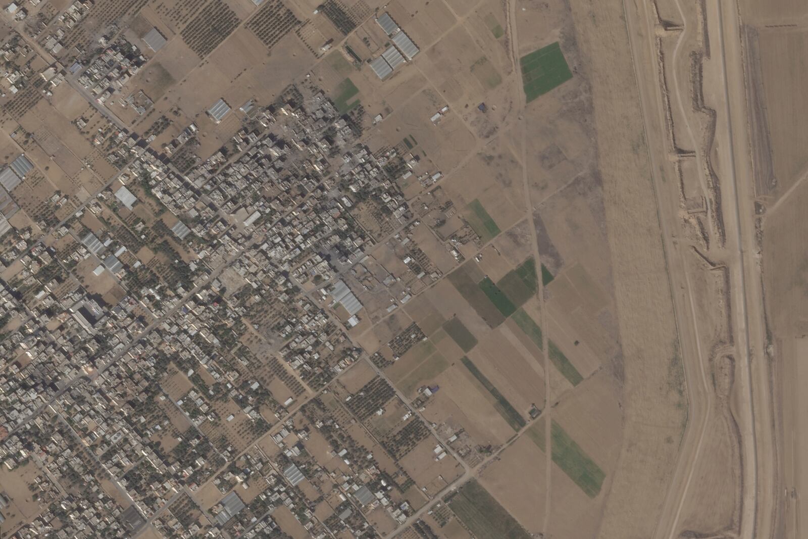 This satellite photo from Planet Labs PBC shows the town of Khuzaa, east of Khan Younis in the southern Gaza Strip in Oct., 2023. (Planet Labs PBC via AP)