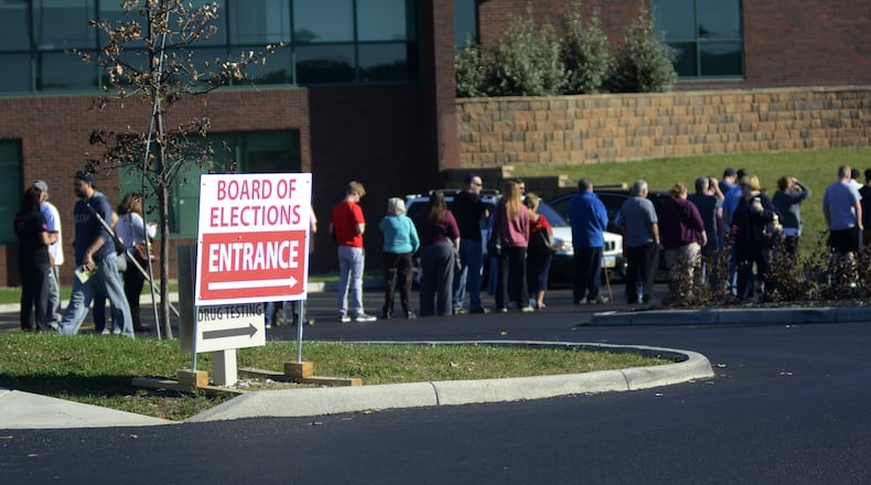 Warren County voters wait to cast their ballot in 2016. MICHAEL D. PITMAN/2016