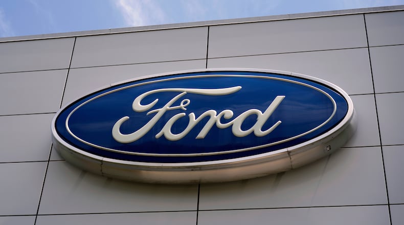 FILE - The Ford logo is displayed above the entrance to the Ford Motor Company Kentucky Truck Plant, Wednesday, April 30, 2025, in Louisville, Ky. (AP Photo/Carolyn Kaster, File)