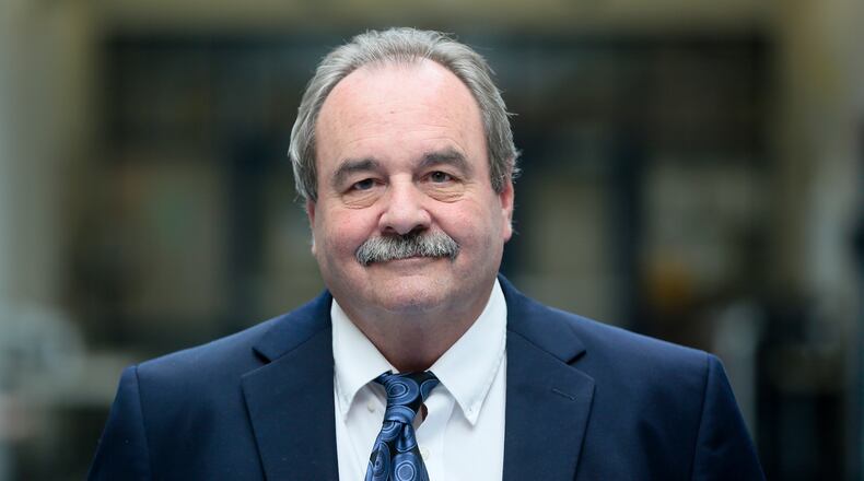 Butler County Job and Family Services Executive Director Bill Morrison will retired May 7 leaving a legacy of innovation and positive change. GREG LYNCH / STAFF