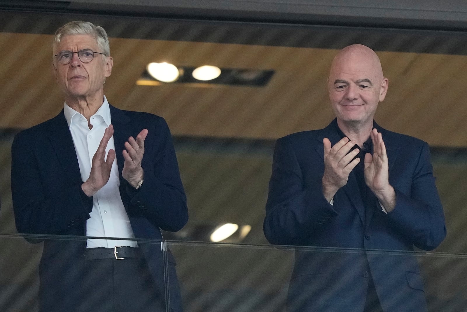 FIFA president Gianni Infantino, right, and Arsene Wenger, Chief Officer (FIFA) and former soccer coach arrive for the Women's Euro 2025 quarterfinals soccer match between Sweden and England at Stadion Letzigrund in Zurich, Switzerland, Thursday, July 17, 2025. (AP Photo/Martin Meissner)