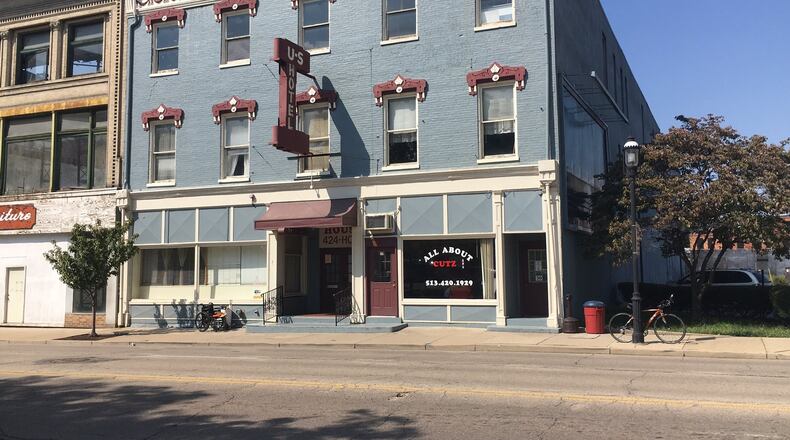 The building that houses Hope House, a homeless shelter, and a barber shop on South Main Street in Middletown has been sold. The new owners plan to help the current two tenants find new space. RICK McCRABB/STAFF