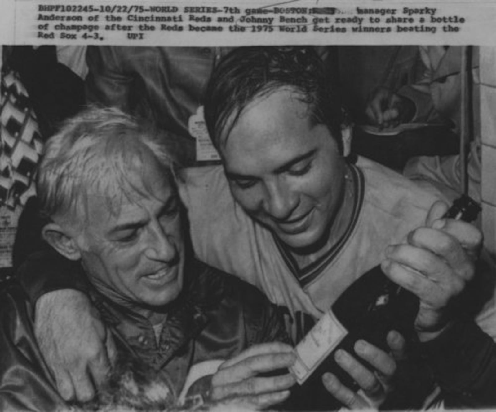 Manager Sparky Anderson and catcher Johnny Bench get ready to share of champagne after the Reds won the 1975 World Series.