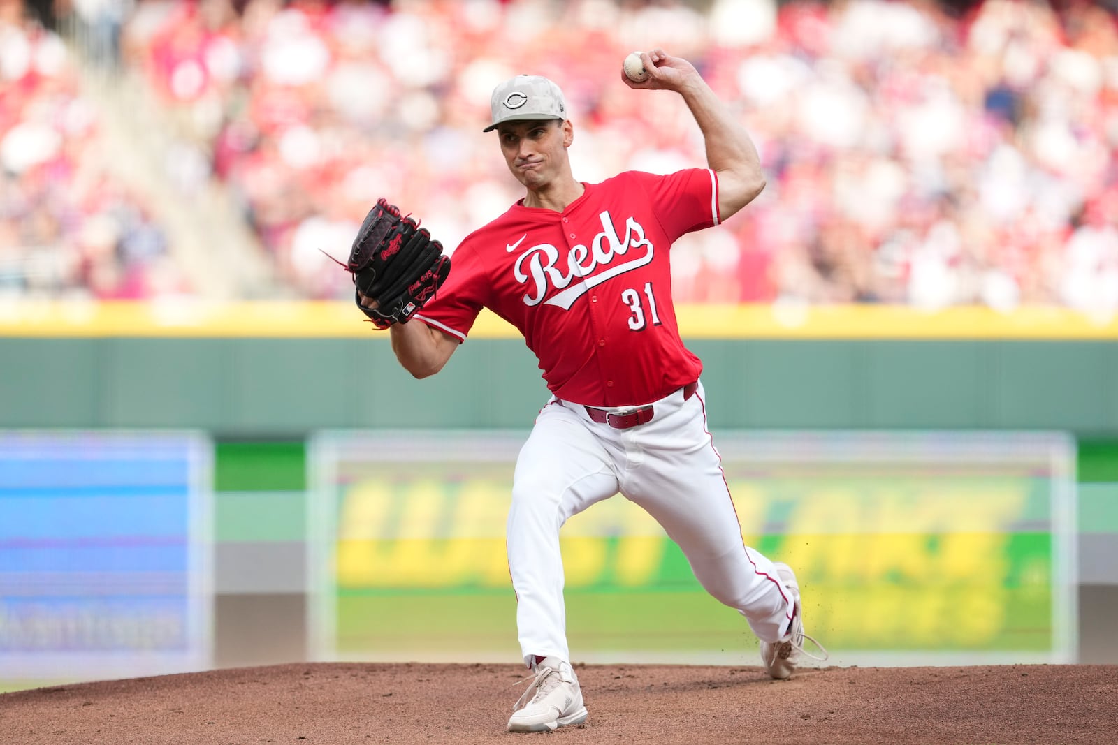 Cincinnati Reds pitcher Brent Suter throws during the first inning of a baseball game against the Cleveland Guardians, Saturday, May 17, 2025, in Cincinnati. (AP Photo/Jeff Dean)