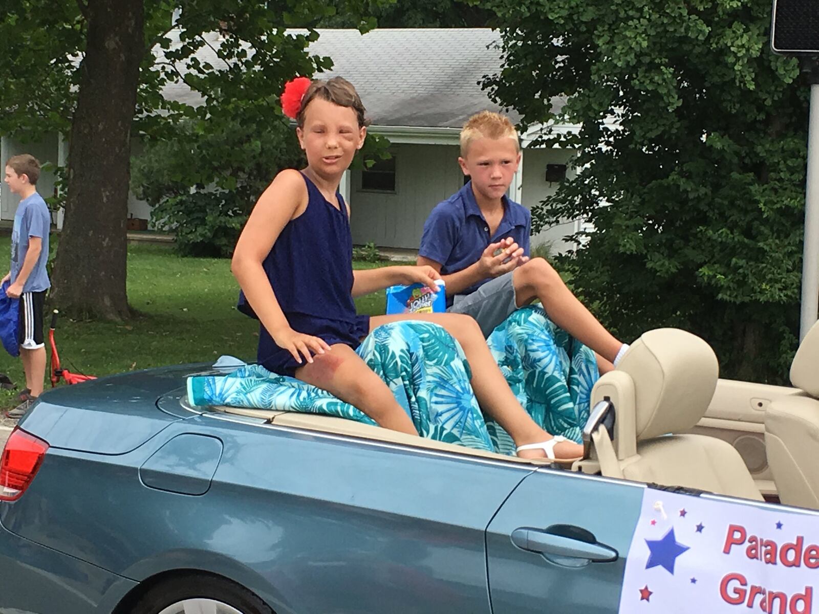 Madison Smallwood was the grand marshal for Wednesday’s Fourth of July Parade in Monroe. Smallwood, 11, is fighting cancer and has underwent several medical procedures in fight against the disease. ED RICHTER/STAFF