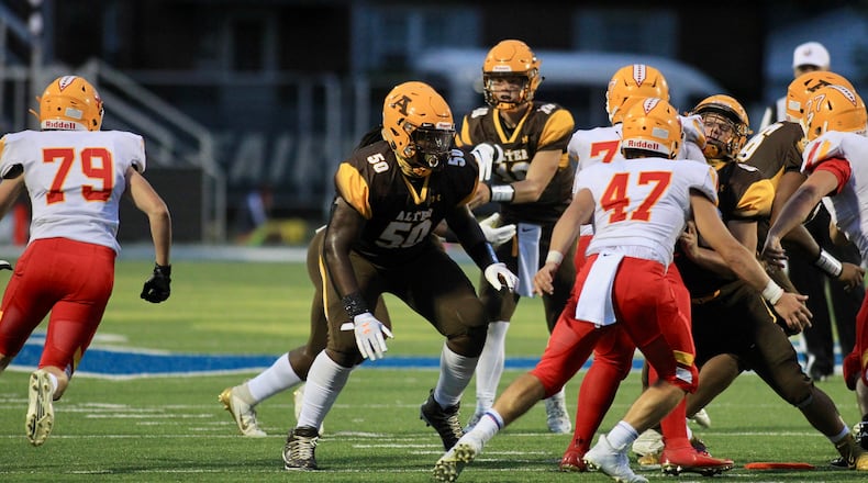 Alter's Derrick Shepard Jr. (50) blocks against Fenwick on Friday, Sept. 11, 2020, at Roush Stadium in Kettering. David Jablonski/Staff