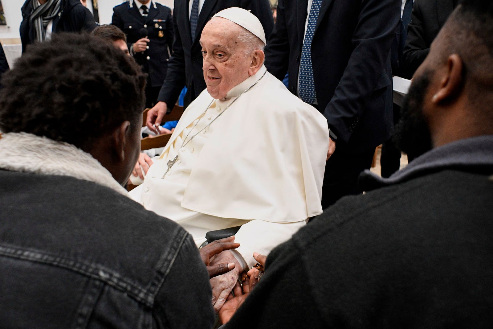 Pope Francis meets with inmates during his visit to the Regina Coeli penitentiary in Rome on Holy Thursday, Thursday, April 17, 2025. (Vatican Media via AP, HO)