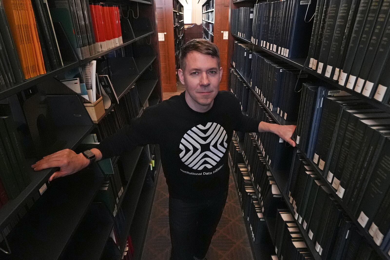 Greg Leppert, executive director at the Institutional Data Initiative, poses at Langdell Hall, which houses the Harvard Law School library, Wednesday, Feb. 26, 2025, in Cambridge, Mass. (AP Photo/Charles Krupa)