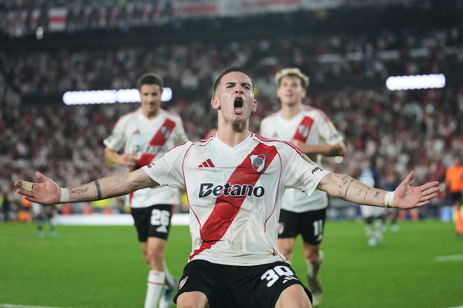 FIL _ Franco Mastantuono of Argentina's River Plate celebrates after scoring from the penalty spot his side's third goal against Ecuador's Independiente del Valle during a Copa Libertadores Group B soccer match at the Monumental stadium in Buenos Aires, Argentina, Thursday, May 15, 2025. (AP Photo/Gustavo Garello, File)