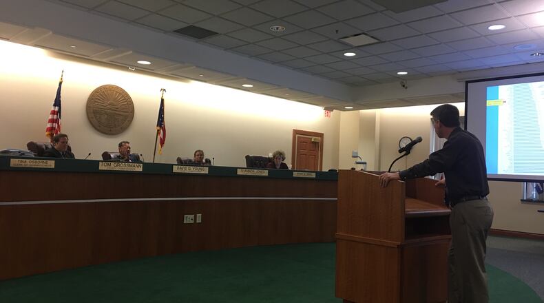 Warren County commissioners during an earlier discussion on $62 million in water system improvements bringing softened water to customers of plants in Franklin and Hamilton Twp. On Tuesday, with Commissioner Tom Grossmann absent, the commissioners agreed to pay a consultant $4.5 million to oversee the project.Staff photo by Lawrence Budd